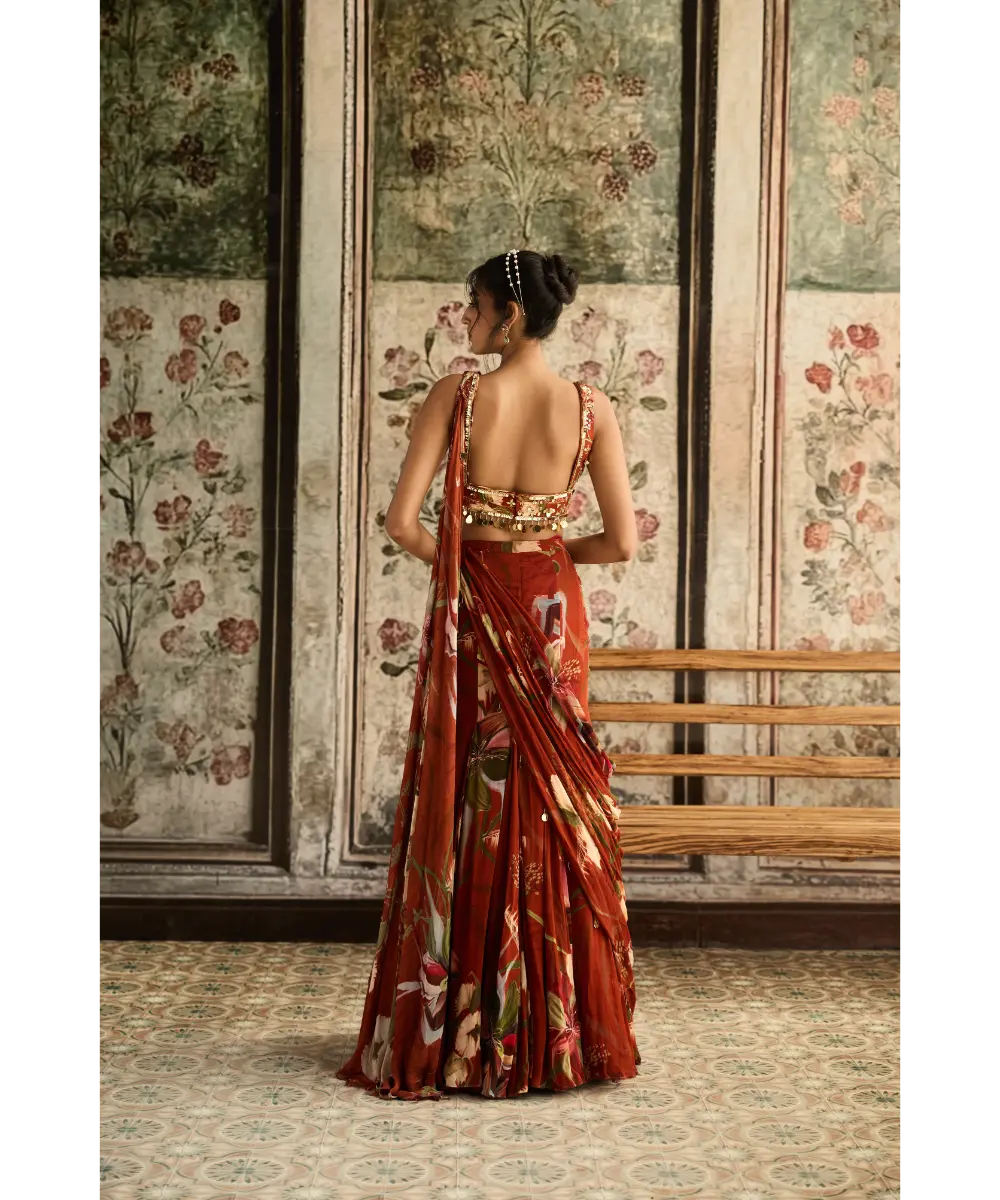 DIYARAJVVIR - RUST FLORAL PRINT AND HIGHLIGHTED  MERMAID SAREE  SET